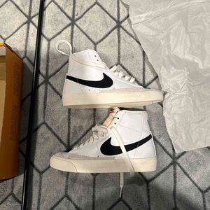 Nike women's White and Black High-Top Sneakers